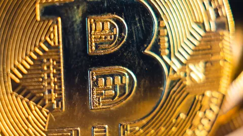 Macro shot of a gold bitcoin coin