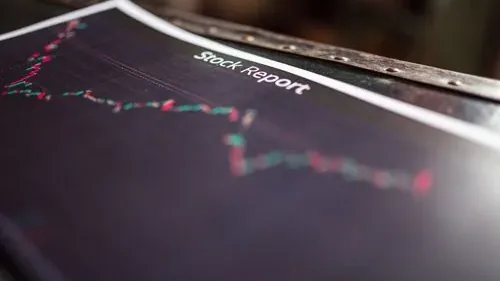 Close-up Shot of a Stock Report