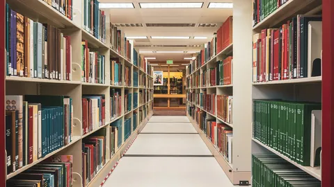 Long corridor of library bookshelves