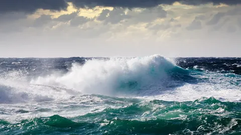 Stormy sea with large breaking waves
