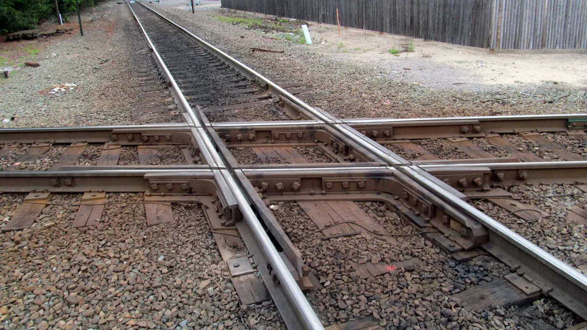Two railway tracks crossing each other at a diamond junction